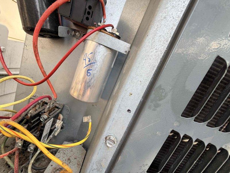 Completed scheduled air conditioning maintenance and fulfillment service on rooftop HVAC unit. Performed system inspection, documenting equipment condition including outdoor condenser unit, electrical components, capacitor, and wiring connections. Unit found operational with normal wear patterns consistent with outdoor installation; all electrical connections secure and components functioning within specifications.