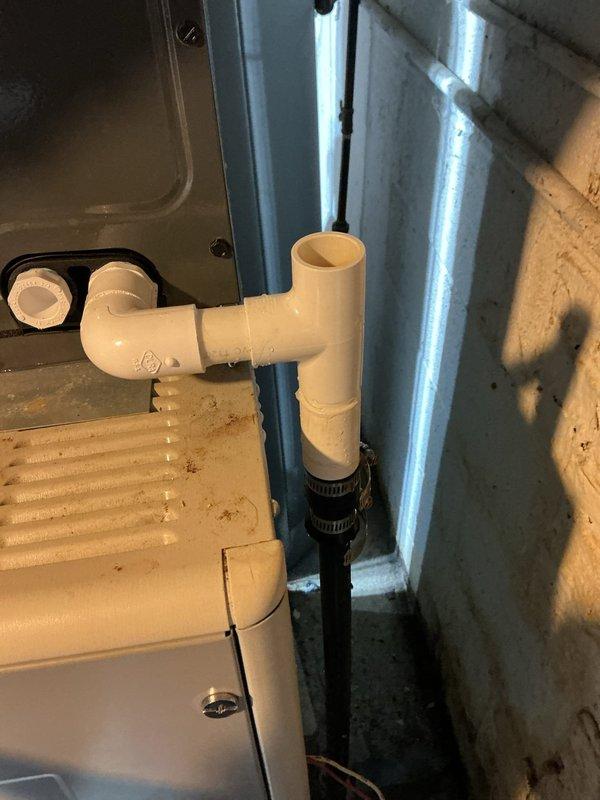 Responded to service call for newly installed air conditioning system that was not operational. Upon inspection, discovered multiple installation deficiencies including improperly insulated refrigerant lines showing deterioration and inadequate sealing at pipe connections. Verified condensate drain line configuration and PVC connections at air handler unit. Corrected piping issues, secured all connections with proper clamps, and ensured proper drainage. System tested and confirmed operational upon completion of repairs.