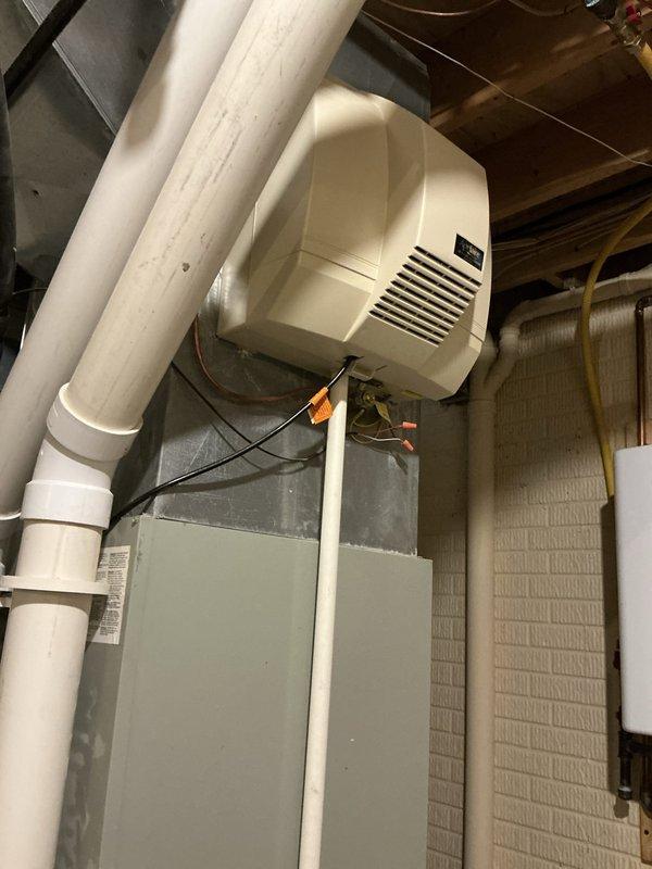 Completed comprehensive estimate for full HVAC system replacement in 4600 square foot residential property with two original systems from 2007. Both systems experiencing complete cooling failure with depleted refrigerant levels and failing furnaces. Assessed second floor 3-ton system as appropriately sized and basement 4-ton system with recommendation for upgrade to 5-ton capacity. Provided estimate specifications for high-efficiency 97%+ AFUE furnaces with PVC venting to replace existing equipment, including evaluation of existing humidifier integration and ductwork compatibility for both zones.