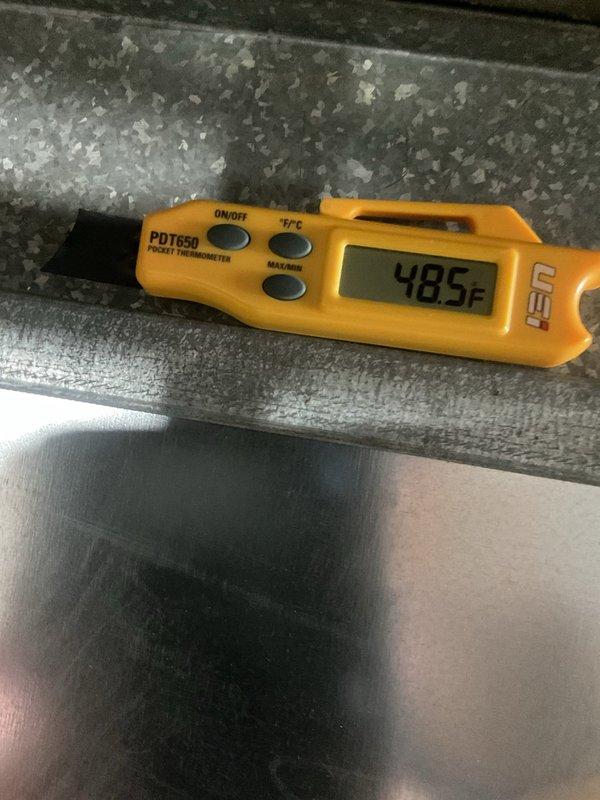 Performed comprehensive cooling system tune-up and inspection on Amana HVAC unit located in basement utility area. Conducted thorough system evaluation including temperature differential measurements across evaporator coil, recording supply air temperature of 48.5°F, verifying proper cooling operation and refrigerant charge. Inspected all mechanical and electrical components, ductwork connections, condensate drainage system, and verified proper airflow throughout the system. All equipment found operating within manufacturer specifications with no deficiencies noted at time of service.