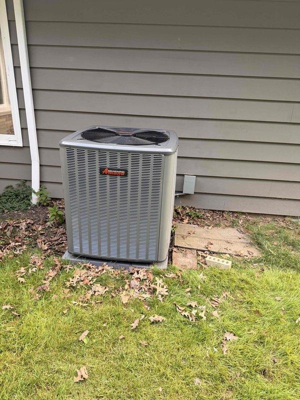 Completed full HVAC system installation including 96% efficiency gas furnace and air conditioning condenser unit. Installed new outdoor condenser on concrete pad against exterior wall with proper clearances, connected refrigerant lines, and established electrical connections. Set condensate drain line with PVC discharge piping. Installed matching high-efficiency furnace indoors, verified proper venting, gas connections, and electrical hookup. Charged system to manufacturer specifications, tested all safety controls, and verified proper airflow and temperature differential across both heating and cooling modes. System operational and performing to specifications.