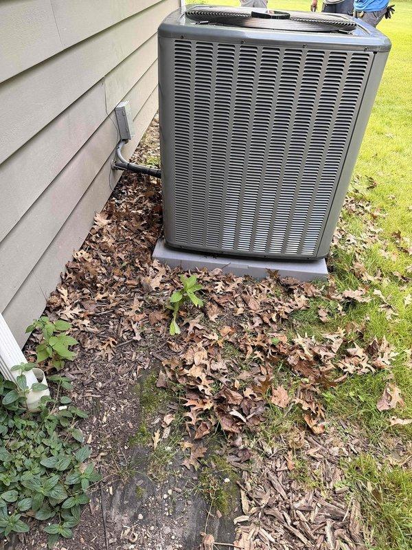 Completed full HVAC system installation including 96% efficiency gas furnace and air conditioning condenser unit. Installed new outdoor condenser on concrete pad against exterior wall with proper clearances, connected refrigerant lines, and established electrical connections. Set condensate drain line with PVC discharge piping. Installed matching high-efficiency furnace indoors, verified proper venting, gas connections, and electrical hookup. Charged system to manufacturer specifications, tested all safety controls, and verified proper airflow and temperature differential across both heating and cooling modes. System operational and performing to specifications.