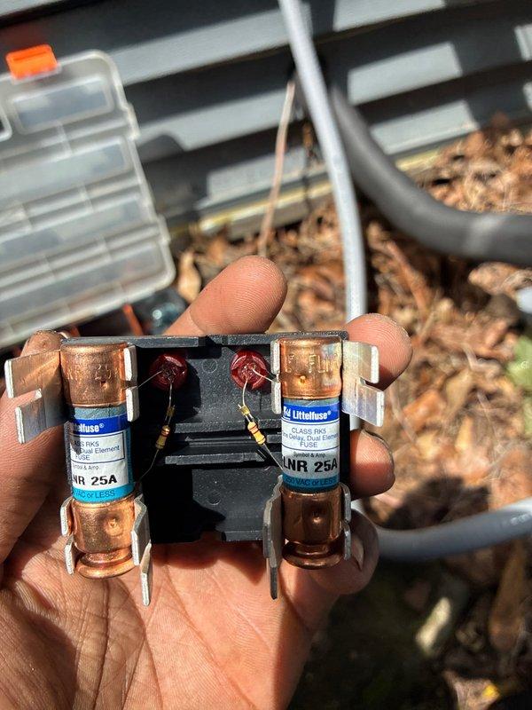 Completed installation of heat pump system with air handler. Installed new electrical disconnect box with proper conduit routing to outdoor unit, verified 25A Class RK5 fuse protection in disconnect assembly, and ensured all electrical connections met code requirements for safe system operation.