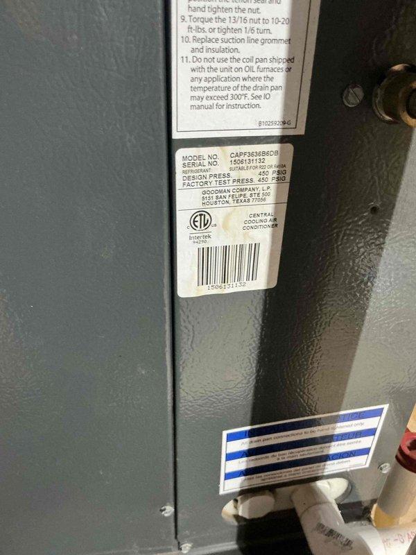 Conducted HVAC system estimate for residential furnace replacement. Documented existing gray-painted vertical furnace unit with dual white PVC venting system, evaluated current installation including electrical panel configuration, refrigerant line routing, and drainage system components. Assessed equipment accessibility and provided replacement options for customer consideration.