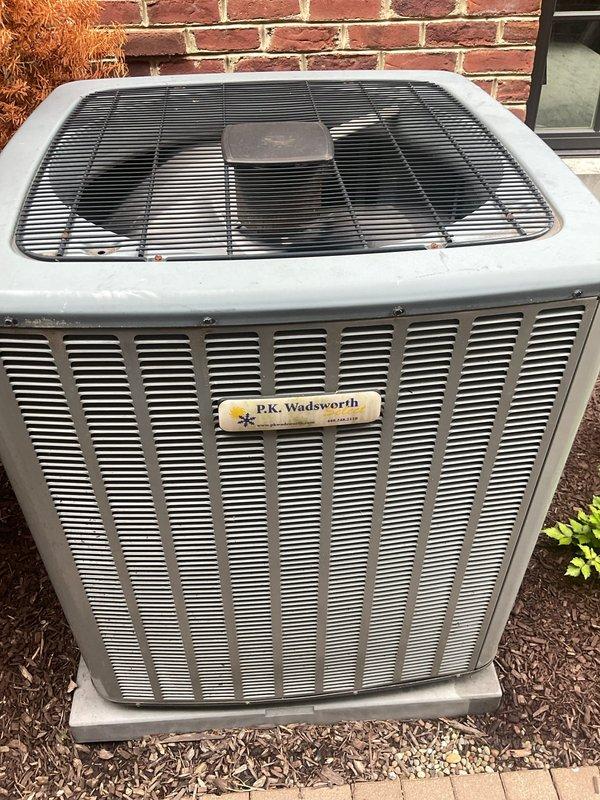 Performed comprehensive cooling system maintenance on residential HVAC unit prior to customer's extended travel. Upon arrival, discovered significant condensation issue on interior ceiling with surface temperature reading of 88.8°F, indicating inadequate insulation or air sealing around ductwork causing moisture accumulation on wood planking. Inspected outdoor condenser unit, which showed normal operating condition with proper placement on composite pad and adequate clearance from brick structure. Completed standard maintenance protocol including visual inspection of all accessible components, verified unit functionality, and documented environmental concerns for follow-up regarding excessive interior condensation that requires attention to prevent potential mold growth or structural damage during customer's absence.