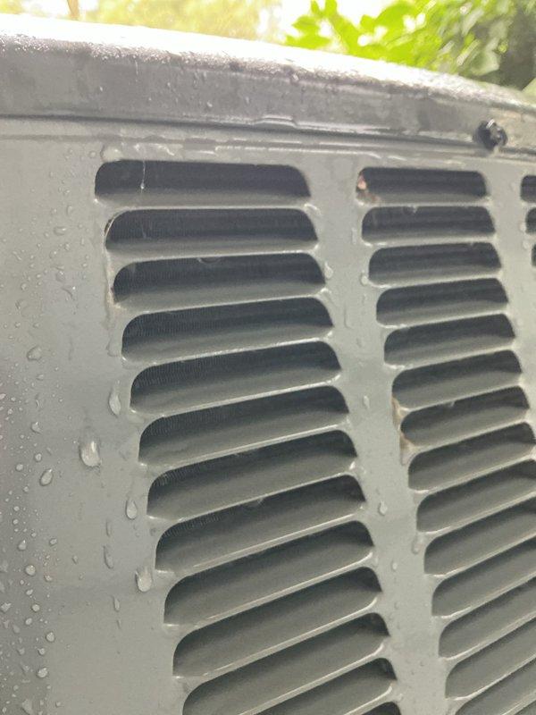 Completed routine cooling maintenance on residential air conditioning system. Performed comprehensive inspection of outdoor condensing unit, verified proper airflow through louvers and fan grille, checked unit for proper operation and drainage evidenced by condensation on exterior panels. All components found in good working condition with no repairs required.