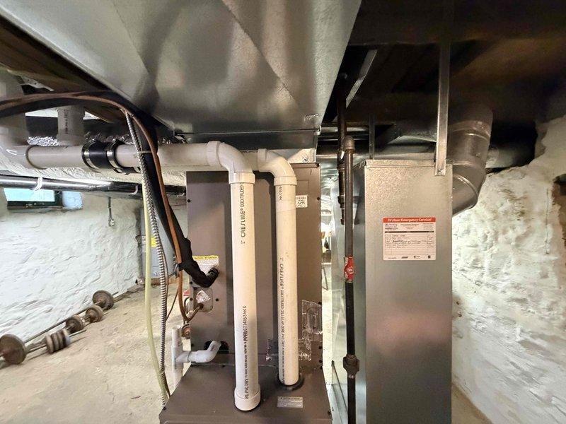 Responded to no-cool complaint where system was continuously running without shutting off. Inspected outdoor condensing unit electrical connections and start relay components, then evaluated indoor air handler and associated refrigerant lines and controls. Diagnosed thermostat control issue preventing proper system cycling and restored normal operation with equipment shutting off at setpoint as designed.