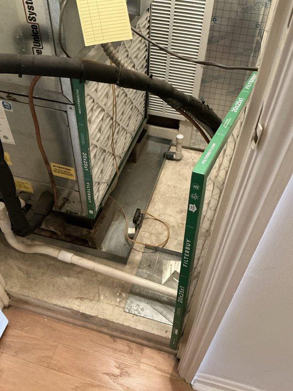 Provided comprehensive estimate for complete HVAC system replacement including furnace and air conditioning unit for residential property with balcony access and elevator availability. Evaluated existing split system configuration with indoor furnace located in utility closet and outdoor condensing unit positioned on concrete pad in landscaped side yard area. Presented two replacement options: standard full system replacement and premium Unico high-velocity heat pump system to address customer's heating and cooling needs.