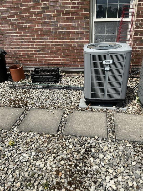 Provided comprehensive estimate for complete HVAC system replacement including furnace and air conditioning unit for residential property with balcony access and elevator availability. Evaluated existing split system configuration with indoor furnace located in utility closet and outdoor condensing unit positioned on concrete pad in landscaped side yard area. Presented two replacement options: standard full system replacement and premium Unico high-velocity heat pump system to address customer's heating and cooling needs.