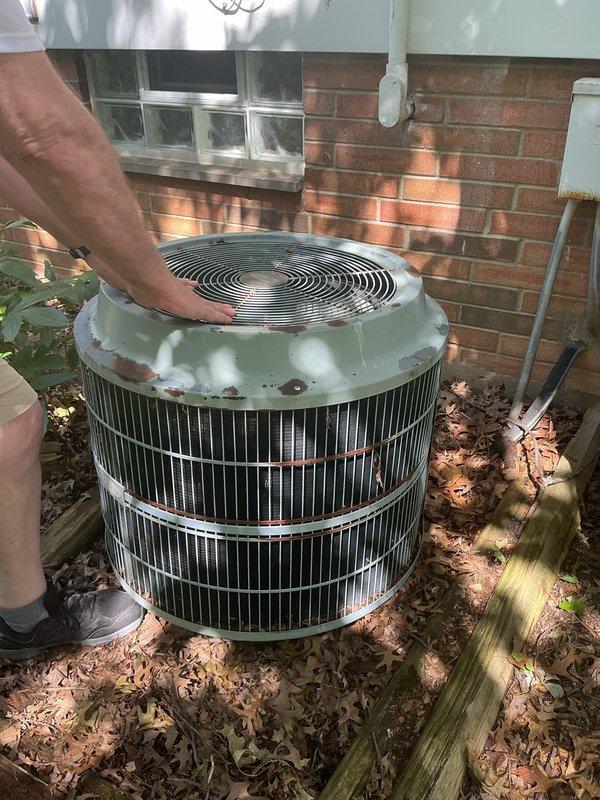 Responded to no cooling complaint on residential air conditioning system. Upon arrival, performed visual inspection of outdoor condensing unit, which showed significant weathering and rust on top cap and exterior components. Removed fan grille cover to access internal components for diagnostic evaluation. Unit exhibited signs of age-related deterioration requiring further assessment. Provided customer with technical recommendations for necessary repairs or system replacement options and discussed financing availability for required work. Diagnostic fee collected per standard service protocol.