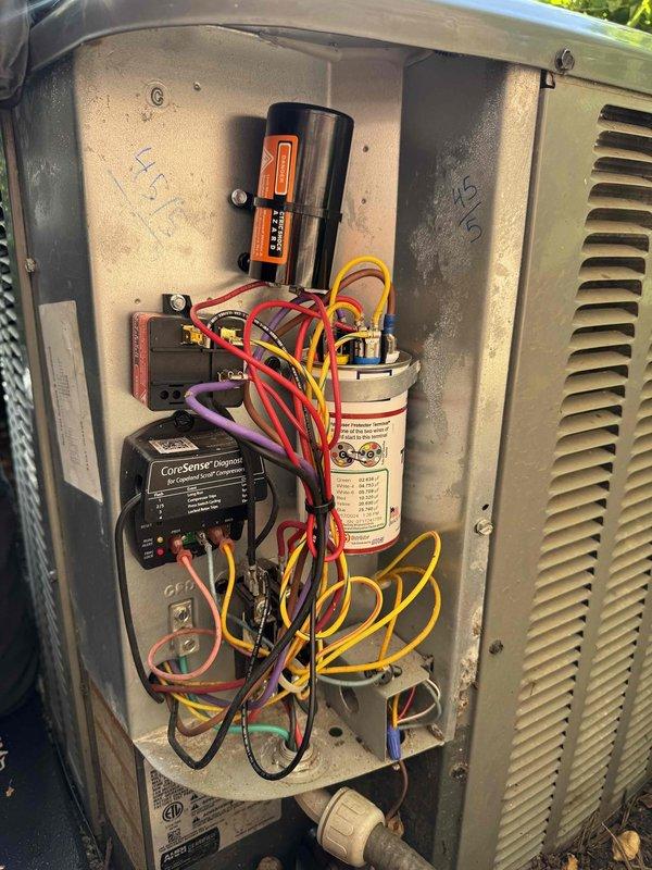 Responded to no cooling call for downstairs Unico system. Performed diagnostic evaluation of outdoor condensing unit and electrical components, including inspection of capacitor, CoreSense control module, and associated wiring connections. System assessed and restored to proper cooling operation.