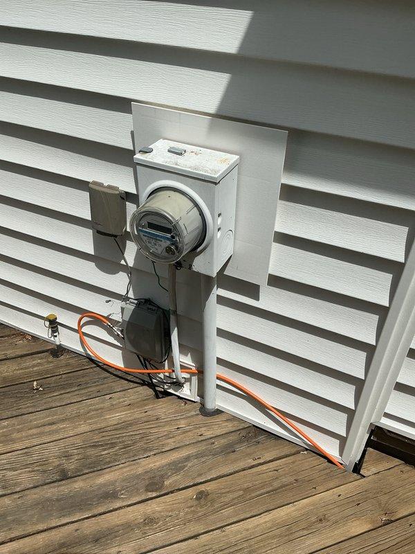 Completed comprehensive electrical inspection of residential property. Documented exterior electrical meter installation, verifying proper mounting, conduit routing, and overall system integrity on main service panel. Inspected basement utility area electrical connections associated with water treatment equipment, confirming safe wiring practices and code compliance. All electrical components photographed for record-keeping purposes, with no immediate safety concerns identified during visual assessment.