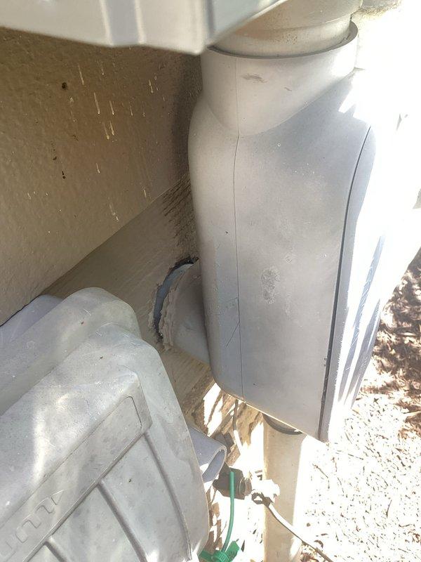 Completed comprehensive electrical inspection of residential service panel and exterior HVAC electrical components. Interior panel inspection revealed properly organized circuit breaker configuration with appropriate wire management, yellow wire connectors at service entry point, and all breakers securely mounted in dual rows. Exterior inspection documented HVAC disconnect and associated refrigerant line insulation with electrical conduit connections to outdoor unit, confirming proper installation and weatherproofing of exterior electrical components.