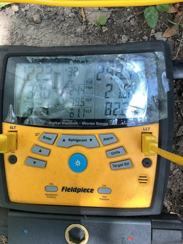 Responded to callback for inadequate cooling following previous refrigerant service. Upon arrival, found system operating with thermostat set to 75°F but actual indoor temperature reading 83°F. Connected digital manifold gauges to measure system pressures and temperatures, with suction line temperature reading approximately 38-39°F. Verified proper system operation, checked refrigerant charge levels, and ensured no issues from previous service call. System parameters brought within normal operating range and cooling capacity restored to manufacturer specifications.