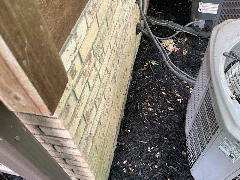 Responded to no cooling complaint on residential air conditioning system. Evaluated existing outdoor condensing unit and provided replacement estimate options for failed equipment. Documentation photos captured multiple HVAC units installed at property exterior beneath elevated deck structure, showing current system configuration and installation environment.