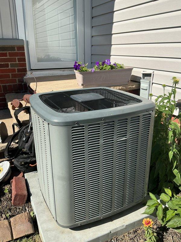 Completed scheduled preventive maintenance on residential air conditioning system. Inspected outdoor condenser unit, indoor air handler components, electrical connections, and capacitor. Verified CoreSense diagnostic system operational and confirmed all safety labels present. System operating within normal parameters with no deficiencies noted.