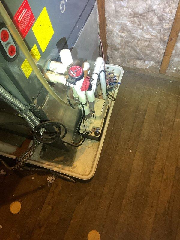 Completed comprehensive cooling maintenance on residential HVAC system located in attic space. Performed full system inspection of air handler unit, replaced air filters, verified proper operation of condensate drain lines and pump assembly, and tested all electrical connections and controls. All components found to be functioning within normal parameters with no issues identified.