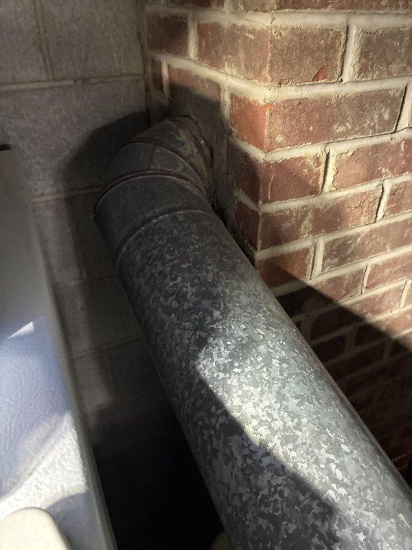 Conducted on-site HVAC system evaluation to provide air conditioning and full system replacement options. Assessed existing equipment accessibility and photographed current ductwork condition, noting significant corrosion and weathering on galvanized metal ducts in basement utility area. Provided comprehensive replacement estimates for both AC-only and complete HVAC system configurations based on easy-access installation conditions.