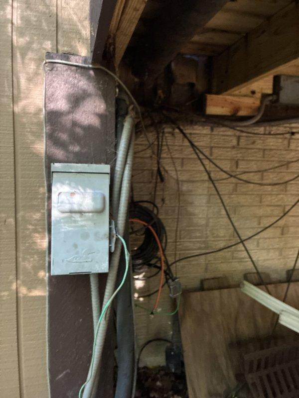 Responded to no cooling complaint on late 1990s HVAC system located in basement mechanical space. Upon arrival, inspected existing vertical air handler unit with associated ductwork, refrigerant lines, and PVC condensate piping showing signs of age and deterioration. Evaluated complete system including exposed copper refrigerant lines, electrical connections, and aged control panel mounted on equipment. Provided customer with replacement options for full HVAC system due to equipment age and lack of cooling functionality.