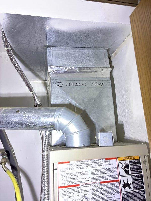 Conducted comprehensive system evaluation and provided replacement options for residential HVAC equipment. Presented customer with full system replacement proposals as well as air conditioning-only replacement alternative, documenting existing outdoor condenser unit on wooden platform with weathered decking and associated refrigerant lines, condensate drainage system, and indoor air handler installation with 12x20x1 filter specifications and aluminum flex ductwork connections.