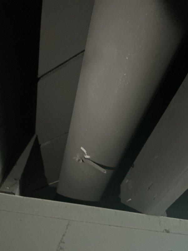Responded to no cooling complaint for upper zone air conditioning system. Upon arrival, performed diagnostic inspection of HVAC equipment and ductwork in mechanical space. Visually inspected PVC condensate drain lines, supply/return ductwork, and refrigerant lines for obvious issues. Documented existing conditions of mechanical systems including galvanized ductwork, copper refrigerant lines, and drainage components. Further diagnostics required to determine root cause of cooling deficiency in upper zone.