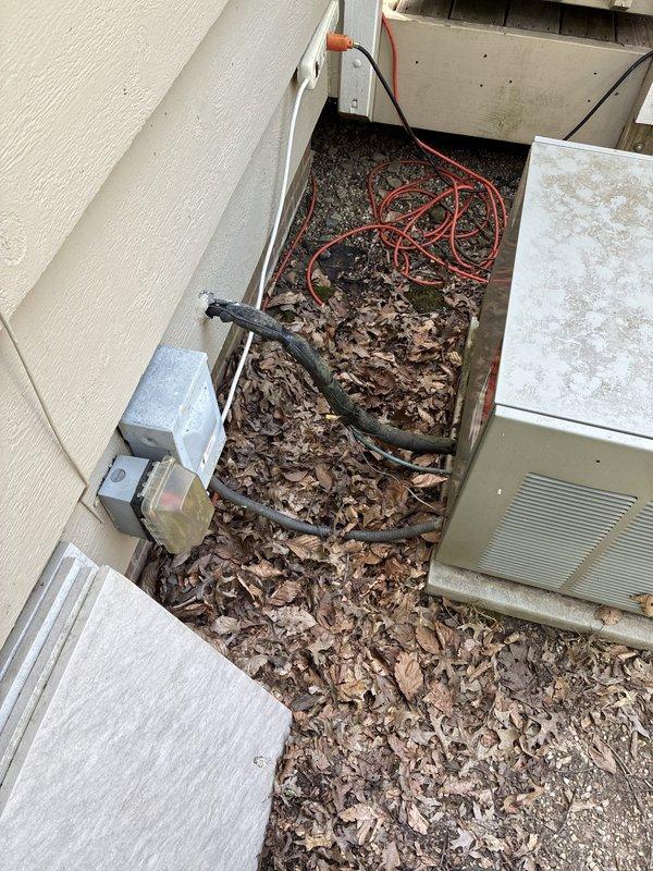Responded to no cooling call and performed system evaluation. Upon inspection, found outdoor HVAC unit located in debris-filled equipment alcove with significant leaf accumulation affecting airflow and system performance. Assessed existing equipment condition, indoor Honeywell digital thermostat functionality, and overall system operation. Provided customer with replacement options and estimates for new HVAC system installation to resolve cooling issue and restore comfort.