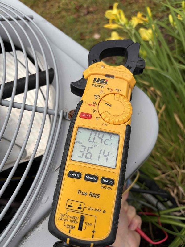 # HVAC Cooling Maintenance Completed

Performed comprehensive preventive maintenance on residential air conditioning system. Conducted electrical diagnostics using clamp meter to verify proper amperage draw and system performance parameters. Inspected outdoor condenser unit, including capacitor, contactor, and electrical connections. All components found operational with normal wear consistent with system age. Unit tested and operating within manufacturer specifications.