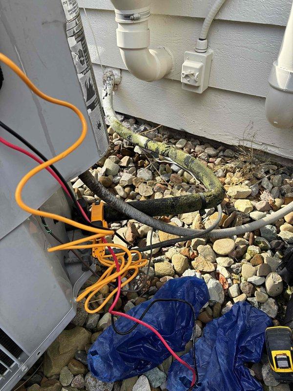Completed scheduled preventive maintenance on two outdoor HVAC cooling systems. Performed comprehensive inspection of electrical components including capacitors, contactors, and wiring connections on both units. Tested system operation and verified all connections were secure with no signs of electrical issues requiring immediate attention.