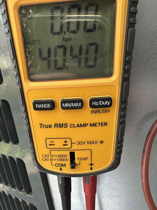 Completed comprehensive cooling system maintenance as part of first-year MVP service agreement. Performed electrical diagnostics using clamp meter to verify capacitor performance reading 4040μF and confirmed proper amperage draw at 0.00A during testing phase. Inspected and documented all electrical connections at terminal block, verifying secure wire terminations across multiple circuits including power supply and control wiring.