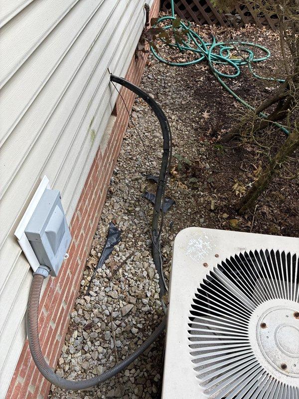 Completed HVAC estimate for replacement of 1997 air conditioning system utilizing R22 refrigerant. Assessed outdoor condenser unit, electrical disconnect, and indoor plumbing connections including copper piping with isolation valves. Documented existing equipment condition and accessibility for future replacement installation.