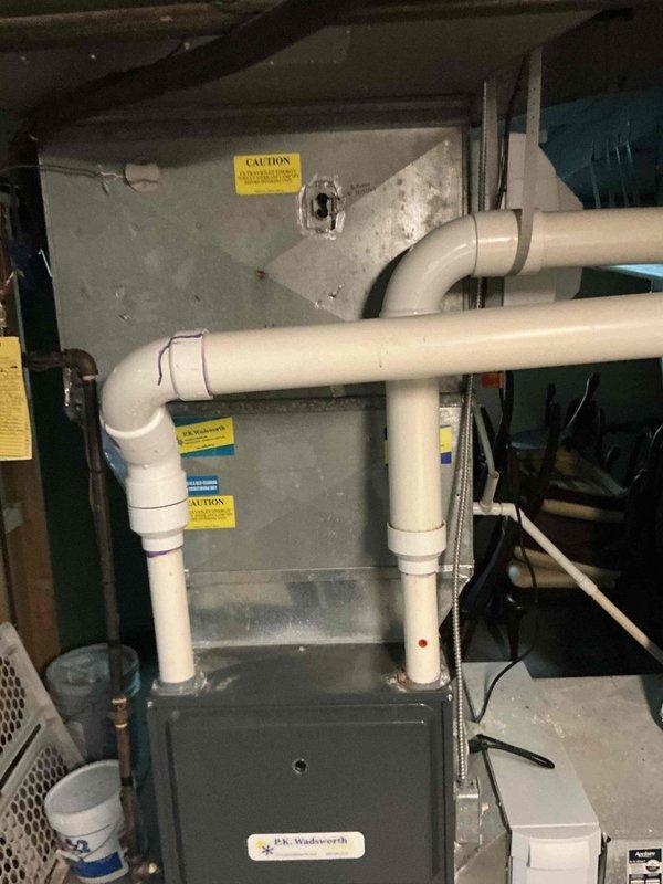 Responded to no cooling complaint and conducted system evaluation. Assessed outdoor condensing unit and indoor furnace/coil assembly to provide replacement options for failed air conditioning system. Documented existing equipment configuration including furnace installation and exterior condensing unit location for estimate preparation.