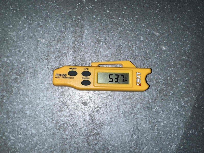 Performed scheduled cooling system maintenance visit. Upon inspection, discovered failed capacitor with visible physical damage including ruptured casing and corrosion at terminal connections. Replaced defective 20.0µF 440/370VAC dual run capacitor with new unit. Verified system temperatures using calibrated infrared thermometer, confirming proper operational parameters post-repair. System restored to full functionality and tested for proper cooling cycle operation.