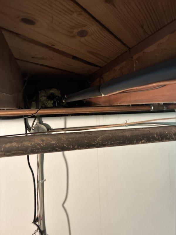 Conducted on-site evaluation for air conditioning system replacement options. Assessed existing electrical service panel and disconnect, documenting circuit breaker configuration and available amperage capacity for new equipment installation. Inspected attic space to evaluate existing refrigerant line routing, electrical wiring pathways, and structural considerations for potential system upgrade, noting that current furnace is of recent vintage and remains serviceable.