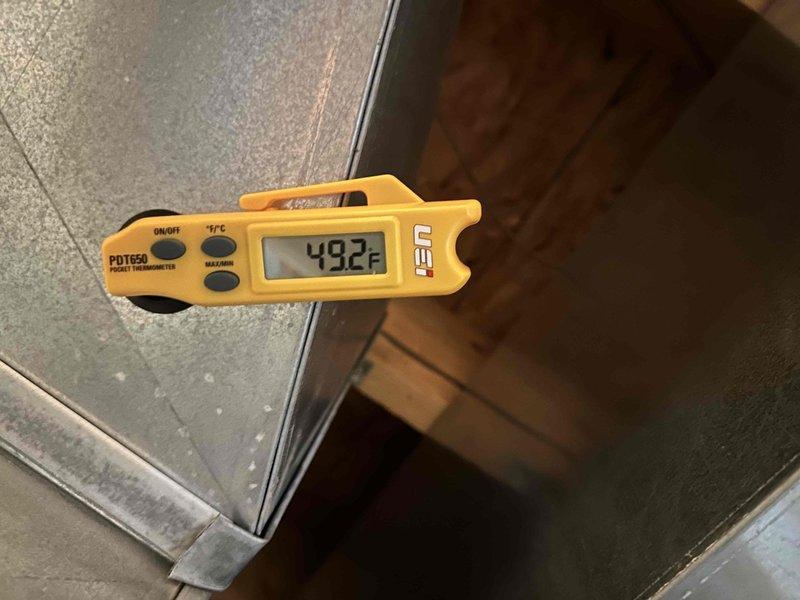 Performed routine HVAC cooling system maintenance inspection. Measured supply air temperature at ductwork registering 482°F and inspected condenser fan assembly for proper operation. Customer declined recommended electrical system evaluation at this time.
