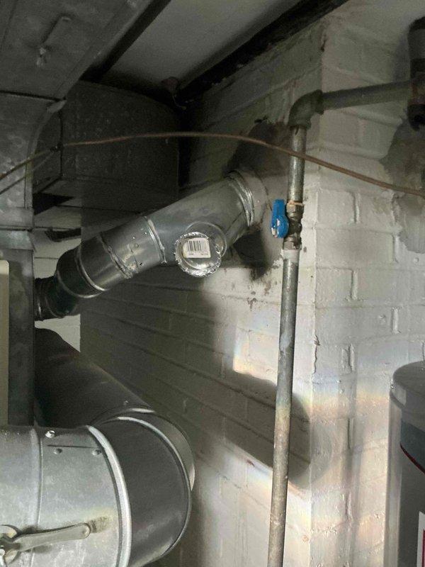 Conducted comprehensive evaluation of existing HVAC system for full replacement estimate. Assessed basement furnace installation with current ductwork configuration and plumbing connections, noting accessible location for equipment changeout. Evaluated outdoor condenser unit positioned on concrete pad with adequate clearance for service access. Provided complete system replacement options including equipment specifications, installation requirements, and upgrade recommendations for improved efficiency and performance.