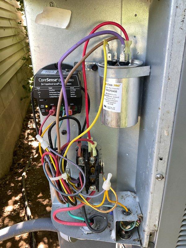 Completed comprehensive heating and cooling maintenance on two HVAC systems. Performed thorough inspection of electrical control components including CoreSense diagnostics module, TITAN PRO capacitor, and contactor with verified proper wiring connections on cooling system. Inspected heating system burner assembly, confirmed proper ignition and blue flame combustion pattern indicating optimal gas-air mixture. Customer declined optional electrical safety inspection. Both systems operating within normal parameters upon completion of preventive maintenance service.