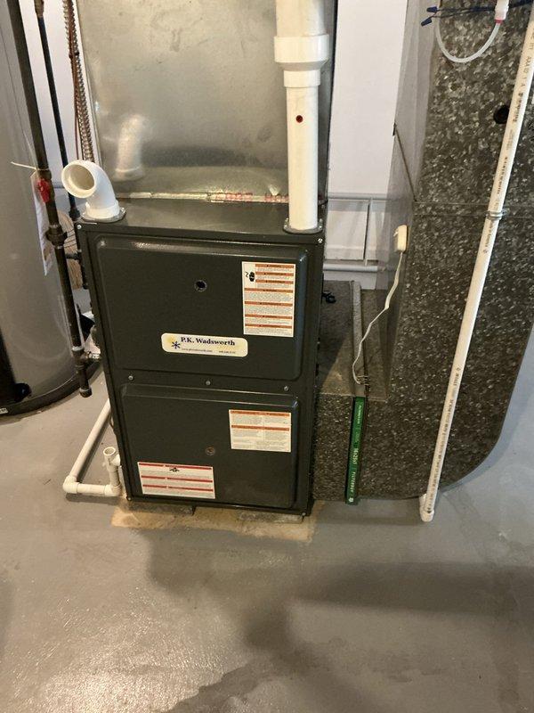 Evaluated existing HVAC system in basement mechanical room for replacement options on south side of residence. Inspected current furnace unit and ductwork configuration, including insulated supply ducts and air distribution system. Documented equipment specifications and assessed installation requirements for new Trane unit to replace aging system.