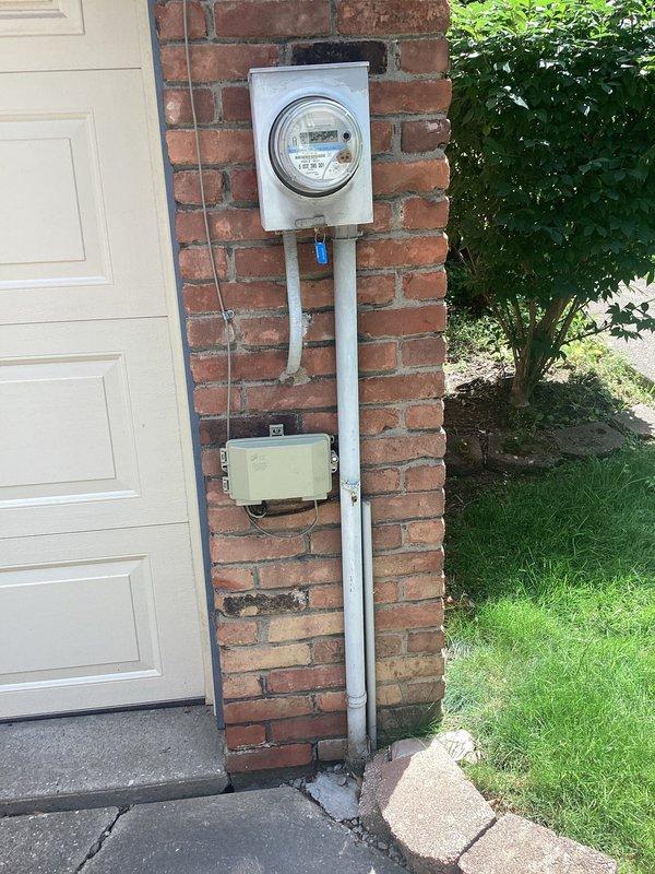 Conducted comprehensive electrical inspection of residential service equipment. Evaluated exterior meter assembly and main service disconnect mounted on brick exterior, documenting current configuration and condition. Performed detailed assessment of interior electrical panel, examining all circuit breakers, bus bars, and branch circuit wiring for code compliance and safety concerns. Documented findings with photographs for panel upgrade quotation and future reference.