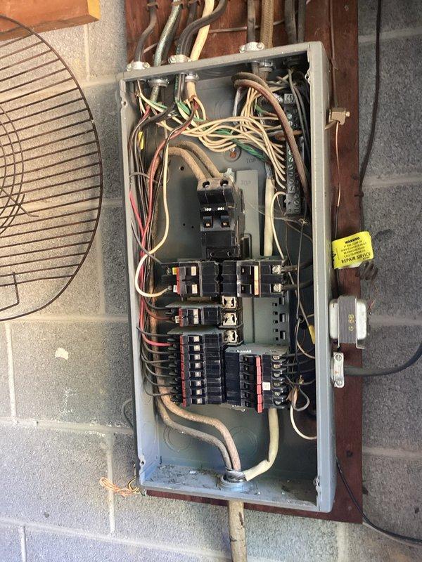Conducted comprehensive electrical inspection of residential service equipment. Evaluated exterior meter assembly and main service disconnect mounted on brick exterior, documenting current configuration and condition. Performed detailed assessment of interior electrical panel, examining all circuit breakers, bus bars, and branch circuit wiring for code compliance and safety concerns. Documented findings with photographs for panel upgrade quotation and future reference.