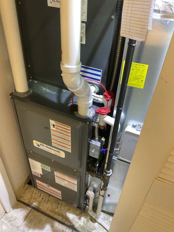 # HVAC Cooling System Maintenance

Completed comprehensive preventive maintenance service on residential HVAC cooling system as part of recurring maintenance agreement. Performed thorough inspection of furnace unit and associated components including condensate drainage system, electrical connections, and gas line connections. Verified proper operation of all safety controls, inspected PVC venting and drainage piping for proper pitch and functionality, and examined electrical conduit and wiring connections for secure termination. All system components found operating within normal parameters with no deficiencies noted. System left in proper working condition.