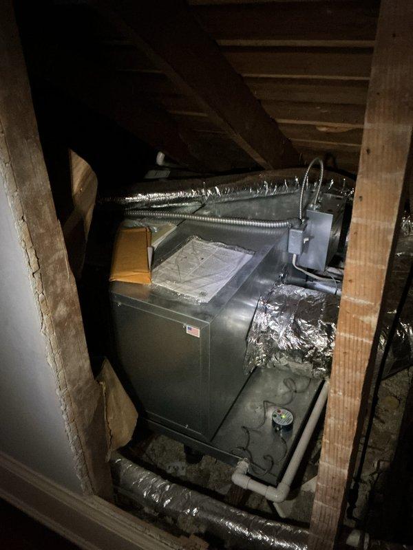 Completed comprehensive tune-up on residential HVAC system located in attic space, including Carrier air handler with electronic air cleaner. Performed standard maintenance procedures: inspected and tested all system components, verified proper operation of electronic air cleaner control panel, checked flexible ductwork connections for secure seals, examined condensate drainage system including PVC piping, and confirmed overall system functionality and airflow.
