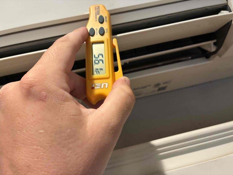 Completed routine air conditioning tune-up on 15-year-old cooling system. Performed comprehensive maintenance including refrigerant line inspection, temperature differential measurements, and system performance evaluation. Unit operating within normal parameters with supply air temperature reading 55°F at time of service. Observed deterioration of foam insulation material on exterior refrigerant lines, which is consistent with age of system. All components functioning properly with no immediate repairs required at this time.