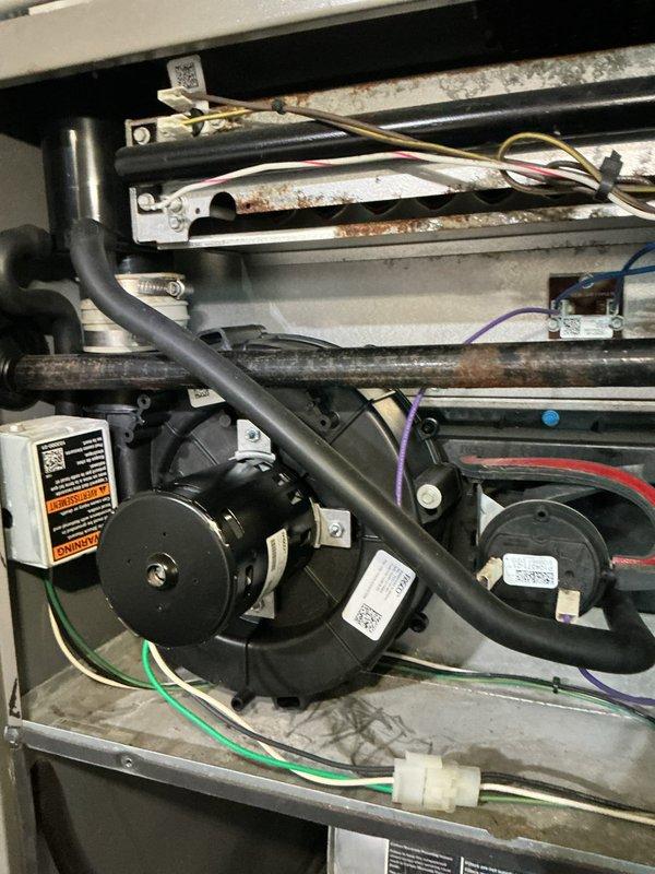 Returned to complete inducer motor replacement on furnace unit. Removed failed inducer assembly, installed new motor with proper mounting hardware and electrical connections, and verified all wiring terminals were secure. System tested successfully with proper draft operation confirmed.