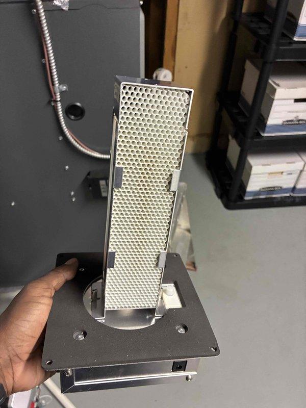 Returned to site to replace defective air scrubber UV bulb as scheduled. Removed existing contaminated filter assembly from air purification unit, installed new UV lamp component, and reassembled system to restore proper air sanitization functionality.
