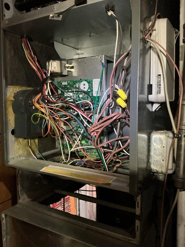 Completed routine cooling season maintenance on residential HVAC system. Performed comprehensive inspection of all mechanical and electrical components, including furnace cabinet interior, control board, blower motor assembly, condensate drainage system, and ductwork connections. Verified proper operation of all system controls, checked electrical connections for security and signs of wear, and confirmed condensate trap and drainage lines are clear and functioning correctly. All components found operating within normal parameters with no immediate service needs identified.