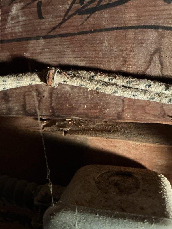 Responded to service call for non-operational air conditioning system on 5-year-old unit. Upon arrival, performed comprehensive system diagnostics and inspection of both indoor and outdoor components. Accessed attic crawl space to inspect air handler, ductwork connections, and related mechanical assemblies. Examined structural mounting points, spring-loaded damper mechanisms, and ventilation components for proper operation and secure installation. Verified all electrical connections, safety devices, and mechanical linkages were intact and functioning within manufacturer specifications. Inspected ductwork for air leaks, proper insulation integrity, and secure fastening to structural members. Documented existing conditions through photographic evidence showing attic infrastructure, HVAC component placement, and overall system configuration. System restored to full operational status with all components verified working correctly.