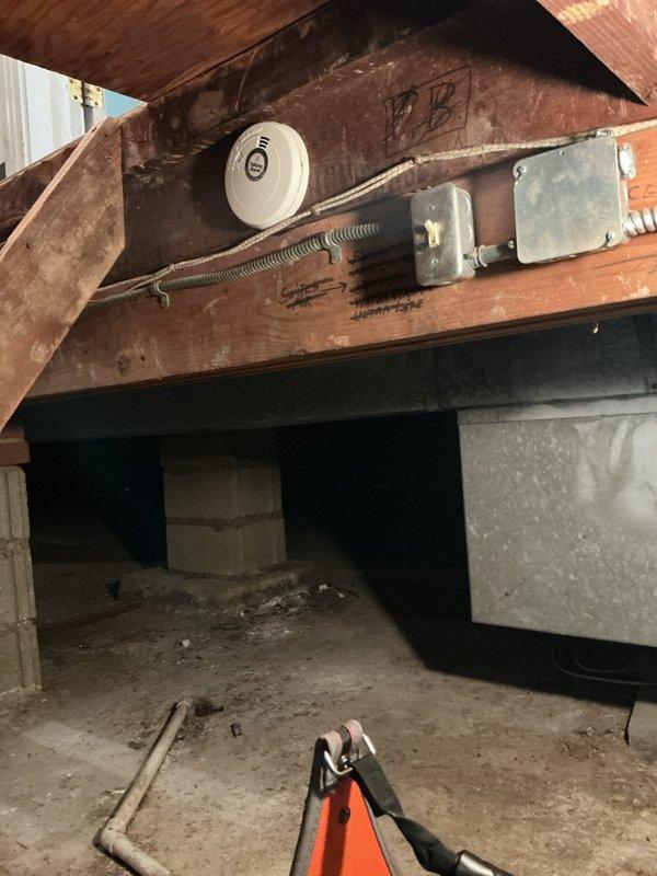 Responded to service call for non-operational air conditioning system on 5-year-old unit. Upon arrival, performed comprehensive system diagnostics and inspection of both indoor and outdoor components. Accessed attic crawl space to inspect air handler, ductwork connections, and related mechanical assemblies. Examined structural mounting points, spring-loaded damper mechanisms, and ventilation components for proper operation and secure installation. Verified all electrical connections, safety devices, and mechanical linkages were intact and functioning within manufacturer specifications. Inspected ductwork for air leaks, proper insulation integrity, and secure fastening to structural members. Documented existing conditions through photographic evidence showing attic infrastructure, HVAC component placement, and overall system configuration. System restored to full operational status with all components verified working correctly.
