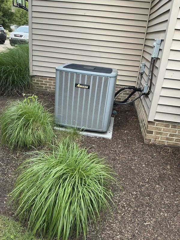 Completed HVAC estimate for air conditioning system replacement at residential property. Evaluated existing Amana condenser unit located on exterior concrete pad with standard landscaping clearance, assessed indoor air handler components including filtration system with 20x25 pleated filter showing normal usage and dust accumulation. Provided replacement options for complete system upgrade with easy access confirmed for future installation.