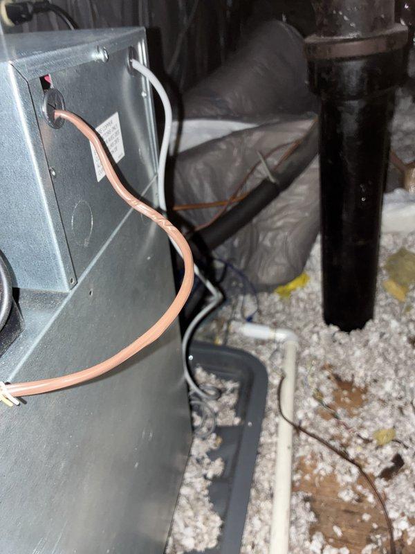 Completed installation of Unico air handler system in attic space. Unit was positioned and secured in existing attic location with proper clearances maintained for service access. Refrigerant lines were routed and connected to the air handler, with copper tubing properly insulated and secured. Electrical connections were terminated at control panel with appropriate conduit installation. Flexible ductwork was installed and secured with proper support strapping throughout the attic space. All equipment was tested for proper operation and system performance verified upon completion.