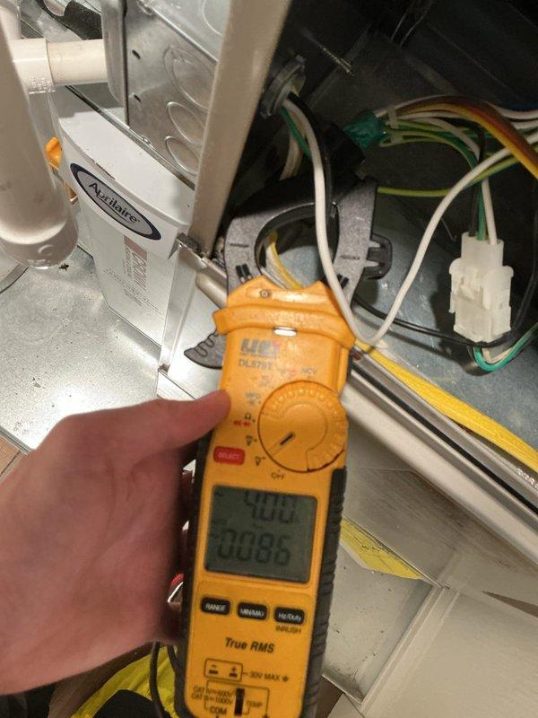 Performed cooling tune-up on Amana air handler system. Conducted electrical diagnostics using clamp meter, recording voltage and amperage readings to verify proper system operation. Inspected filter compartment and staged replacement filters for installation, ensuring optimal airflow and system efficiency.